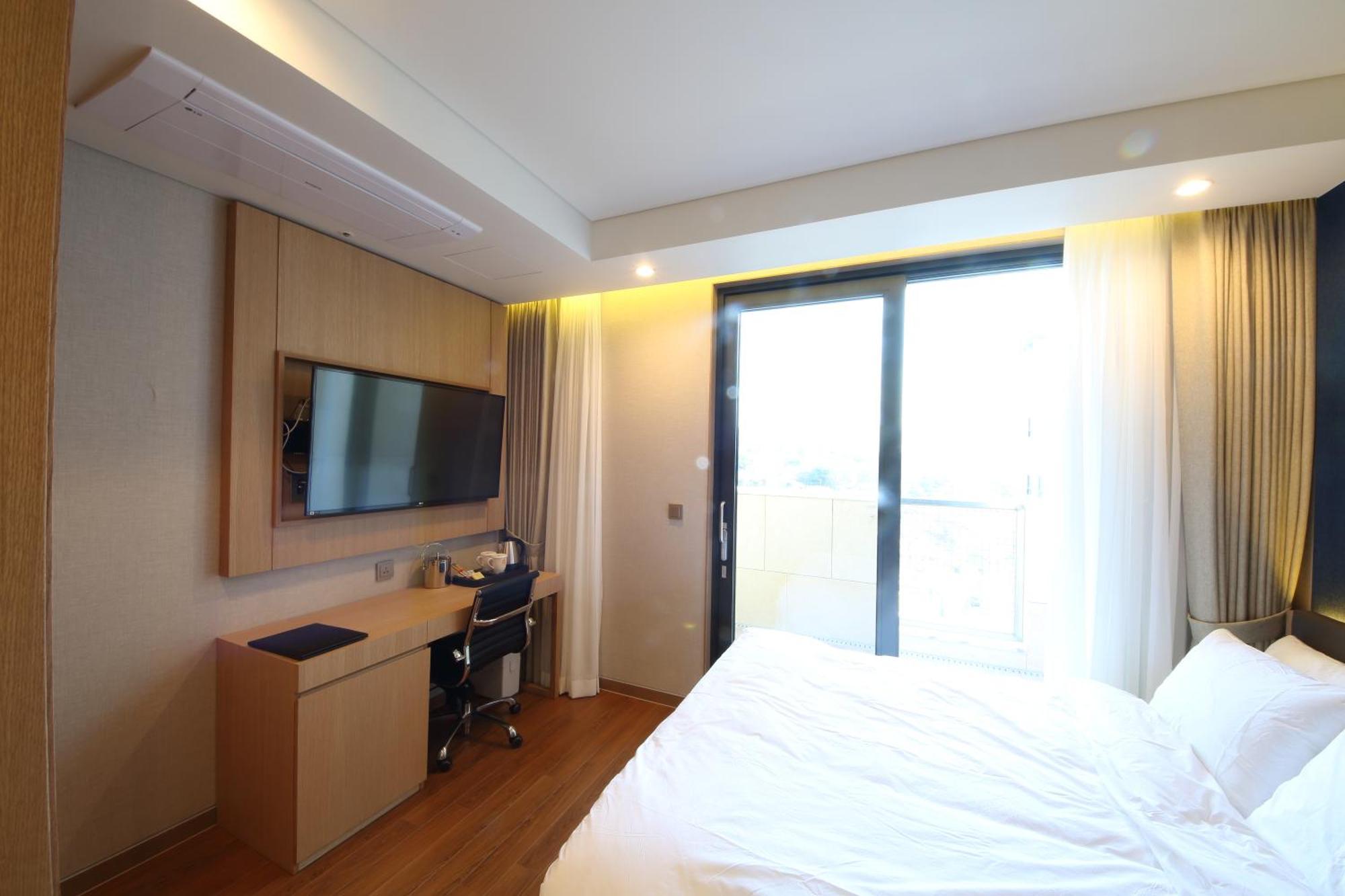 Benikea The H Hotel Hwaseong Стая снимка